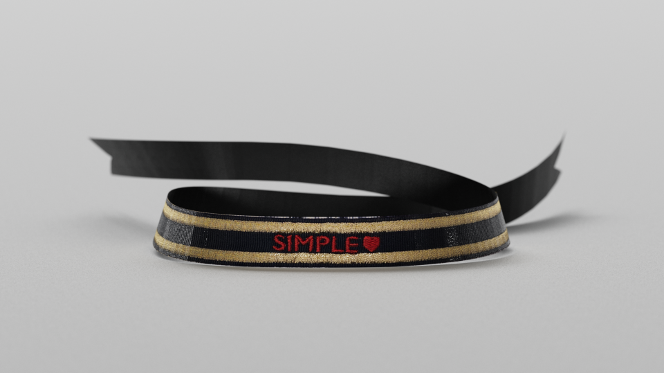 Bracelet with Red Writing.
